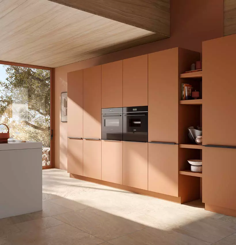 Häcker Küche in Terrakotta mit Einbaugeräten bei JA KÜCHEN Küchenstudio in Herford, moderne Einbauküche mit warmen Farbtönen